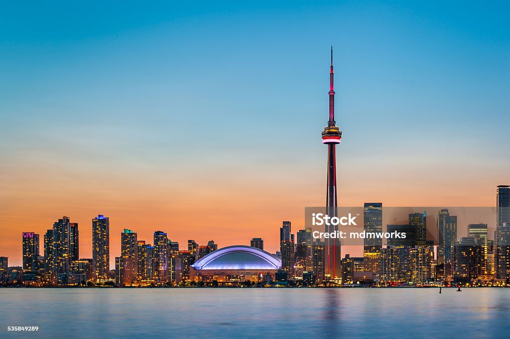 Toronto Skyline at twilight Skyline of Toronto over Ontario Lake at twilight Toronto Stock Photo
