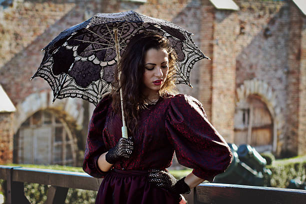 istock Renaissance girl with umbrella 535849687