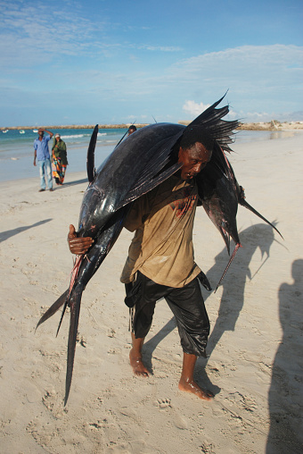 Mogadishu, Somalia-April 30, 3013: Fishermen at the port of Mogadishun in Somalia.