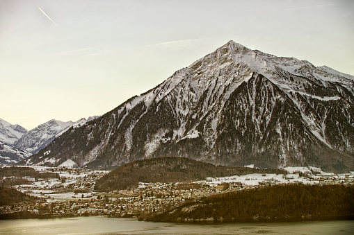 A panorama of Niesen mountain peak near the Thun lake in winter