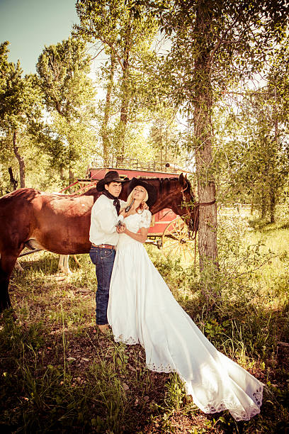 istock Cowboy Pointing A Gun At His Bride 535851827