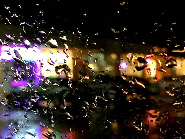 istock Shops from car window in the rain 535852651
