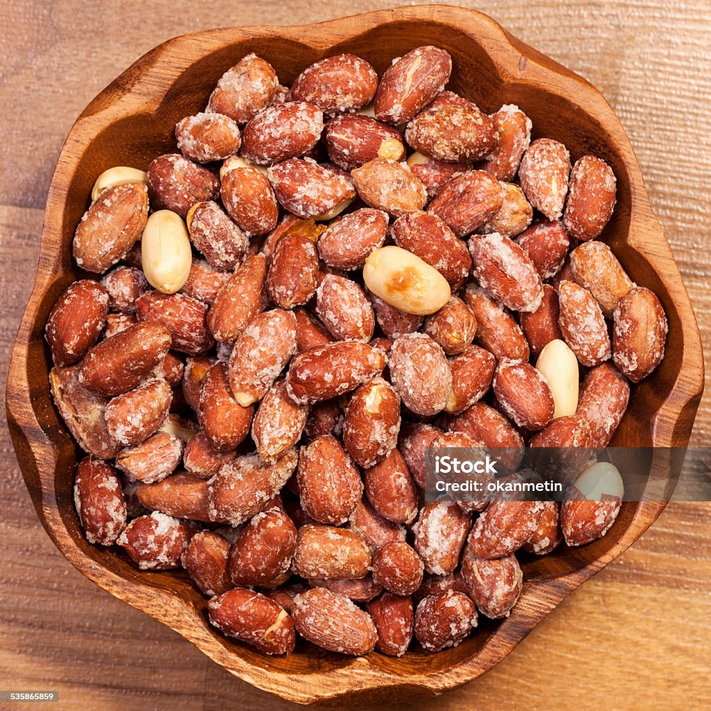 peanut Almonds  on floor in studio shot 2015 Stock Photo