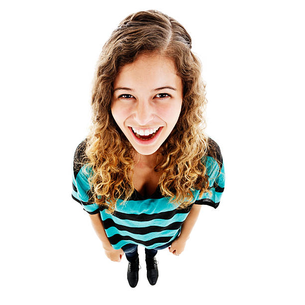 istock Looking down at happily smiling, curly-haired cutie 535869635