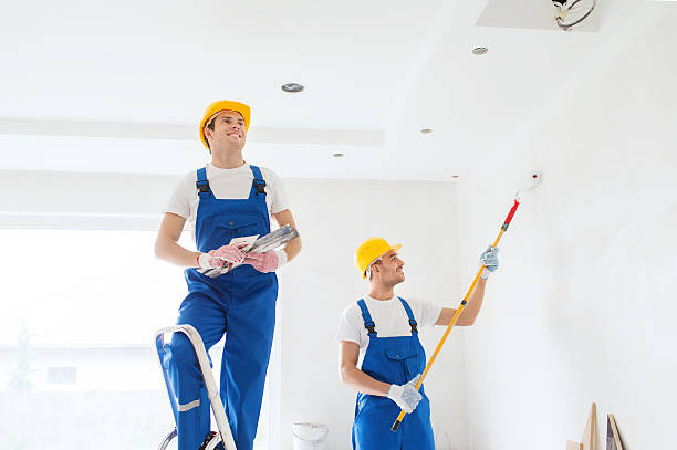 istock group of builders with tools indoors 535870247