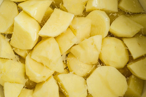 istock Closeup of raw peeled potatoes 535870333
