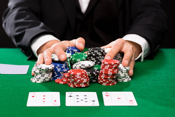istock poker player with cards and chips at casino 535871401