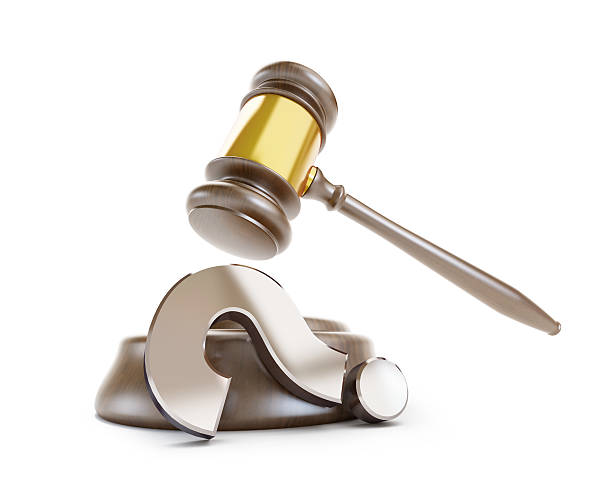 gavel question mark on a white background stock photo