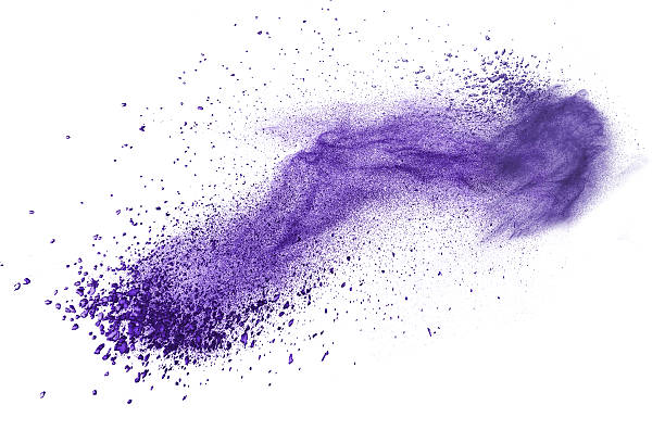 Purple powder explosion isolated on white stock photo