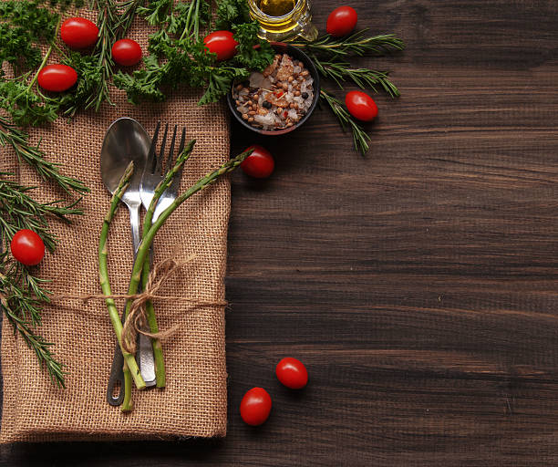 istock Table with cutlery, herbs, tomatoes and spices 535875443