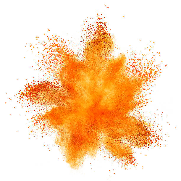 orange powder explosion isolated on white - färgbild bildbanksfoton och bilder
