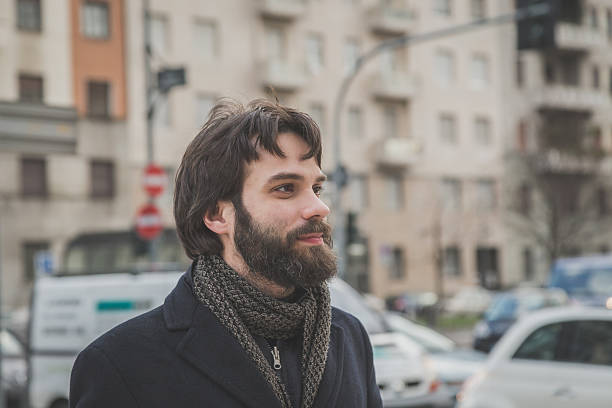 istock Young handsome bearded man posing in the city streets 535887243