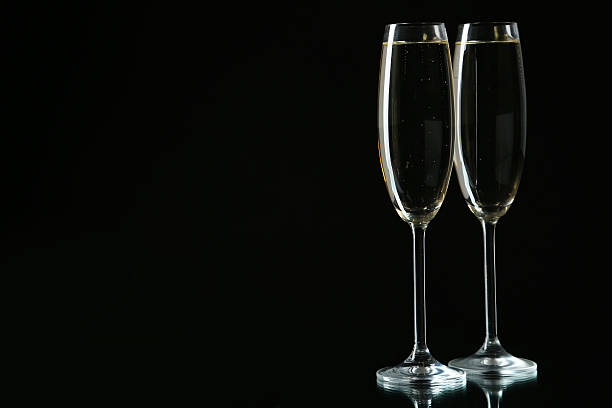 istock Glasses of champagne on a black background 535888609