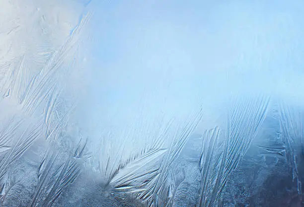 Winter background, frost on window