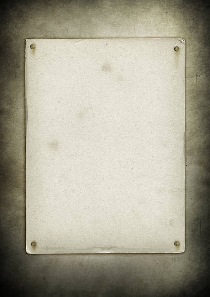 istock Blank old poster nailed on a grunge wall 535890485