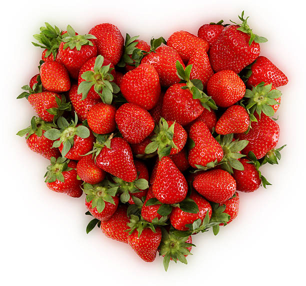 istock red strawberries in heart shape 535890951