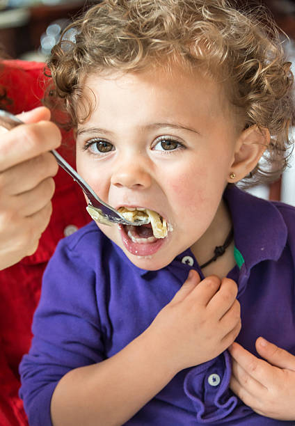 istock Little girl eating 535891461