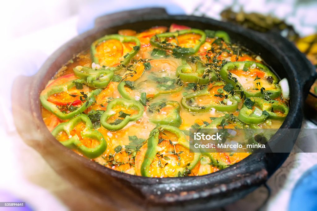 Amazing homemade cod with peppers. Colored photography. Cod with peppers with natural lighting. 2015 Stock Photo