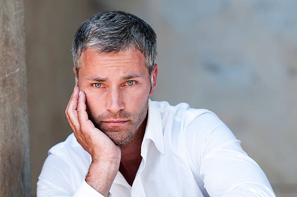 istock pensive man with grey hair 535894897