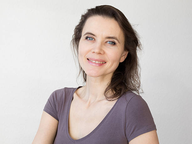 istock Woman with attractive smile looking into camera 535894969