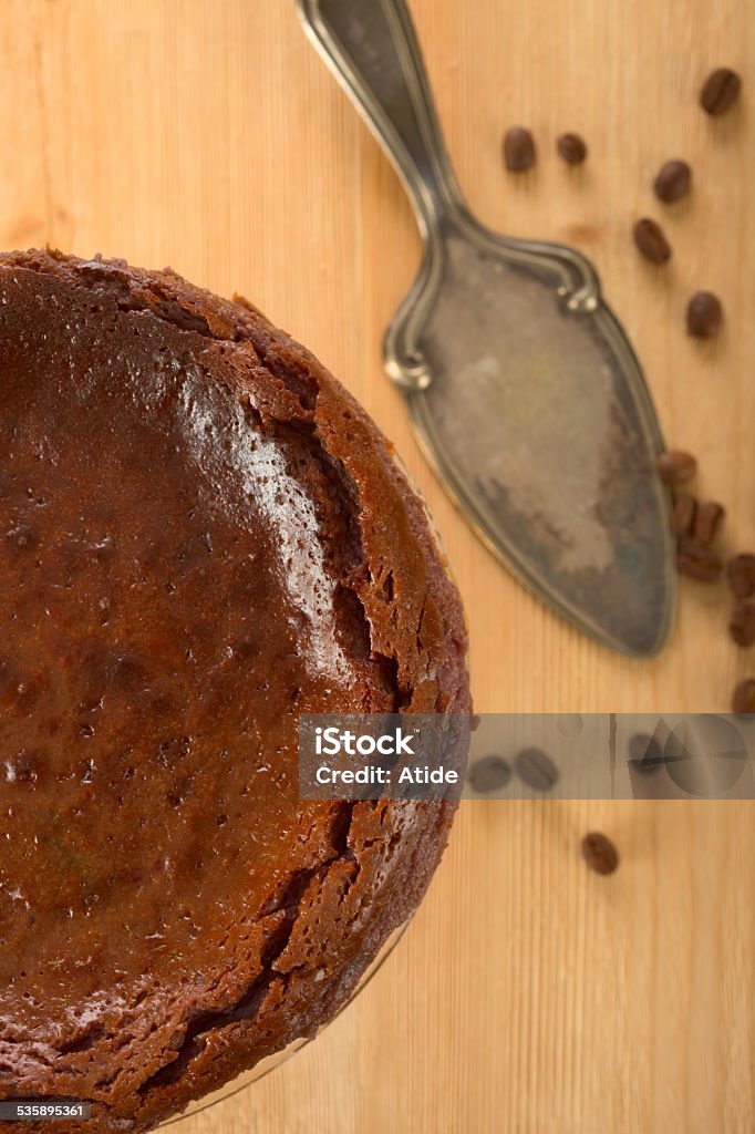 Chocolate cake Chocolate cake on a cake platter and coffee bean. 2015 Stock Photo