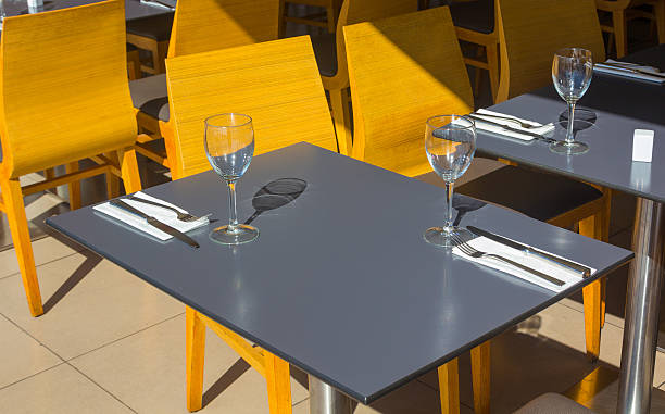 istock restaurant tables with silverware and glasses ready for a lunch 535895535
