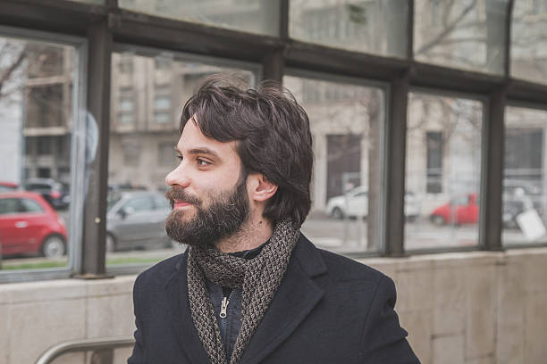 istock Young handsome bearded man posing in the city streets 535895775