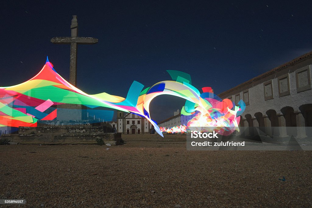 Light Painting by the Church Light Painting photo by a church in the Nossa Senhora do Cabo sanctuary in the Cabo Espichel cape in the Setubal District, Portugal. Film and grain simulation on processing. Long exposure and Pixelstick used at picture taken. 2015 Stock Photo