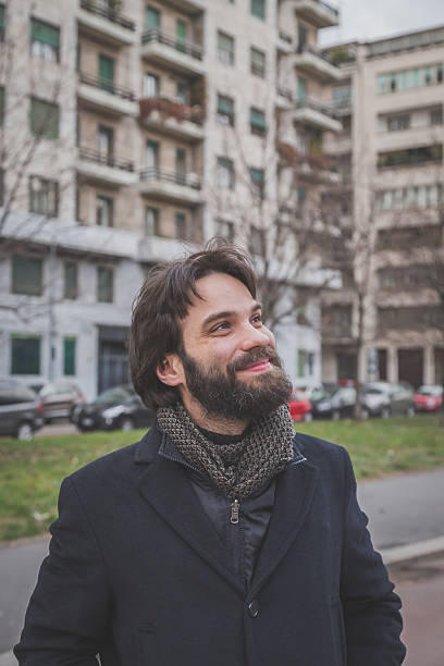 istock Young handsome bearded man posing in the city streets 535898805