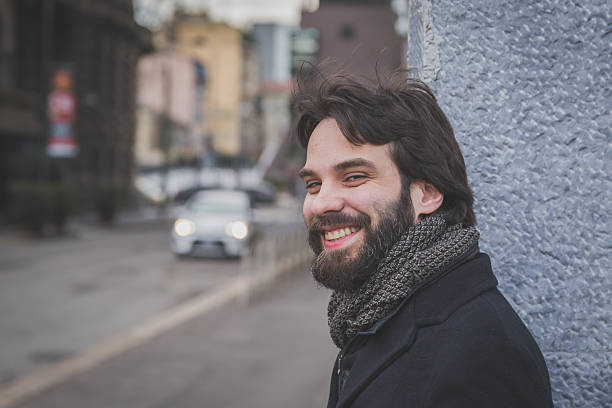 istock Young handsome bearded man posing in the city streets 535898811