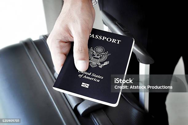 Hand Holding Us Passport Stock Photo - Download Image Now - Journey, Passport, Showing