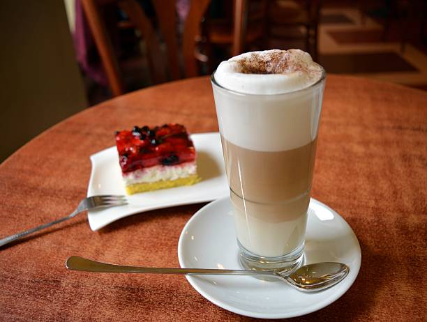 Latte Macchiato In Glass Cup And Strawberry Cake