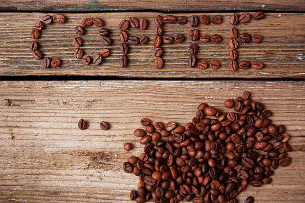 istock coffee beans on wooden background 535912347