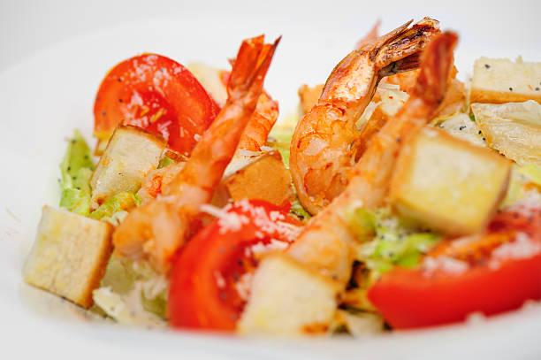 Glazed prawn salad, green leaves, tomato and hearts of palm in a basket of dough - Buenos Aires - Argentina