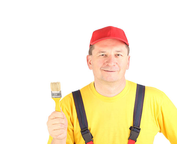 istock Painter holding painting brush. 535916161