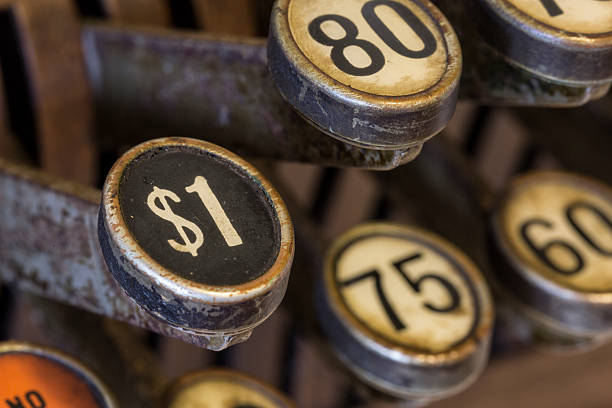 istock One Dollar Button on Old Cash Register Finance Image 535917971