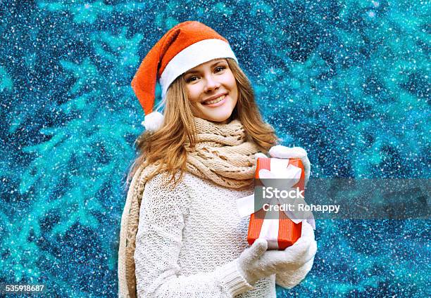 Christmas And People Concept Happy Pretty Woman Stock Photo - Download Image Now - 2015, Adult, Cap - Hat
