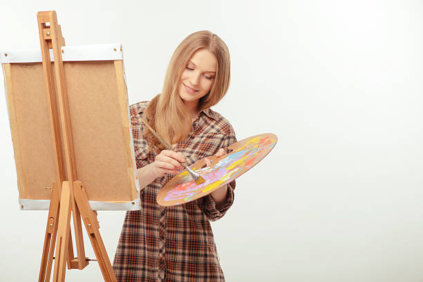 istock Young beautiful artist creating a masterpiece 535919153