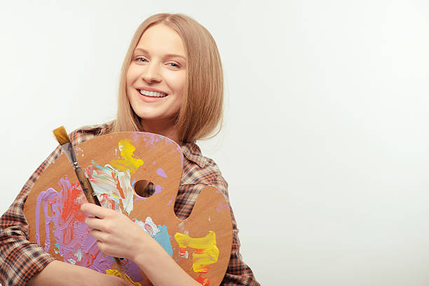istock Young beautiful artist posing with a palette 535919337