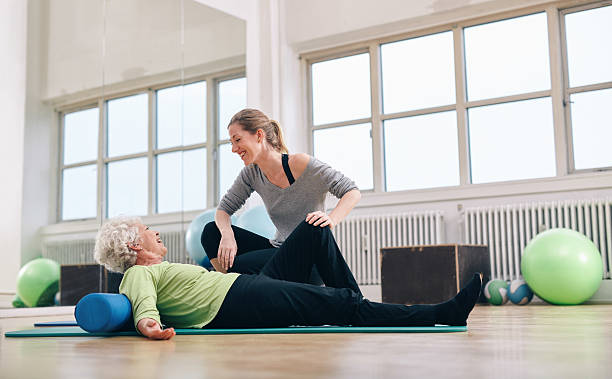 istock Senior woman having a friendly chat with her personal trainer 535920511