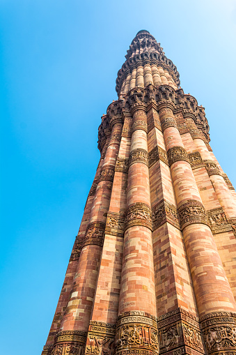 Qutub (Qutb) Minar, the tallest free-standing stone tower in the world, and the tallest minaret in India, constructed with red sandstone and marble in 1199 AD. Unesco World Heritage, India.