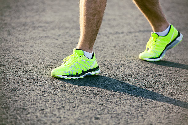 istock Runnning shoes on runner 535931623