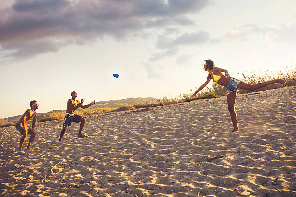 istock Playing on the beach with a freesbi 535932535