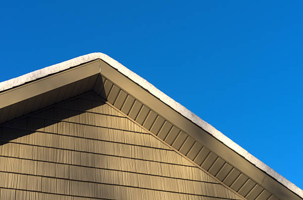 istock Snow on Roof Peak 535932795