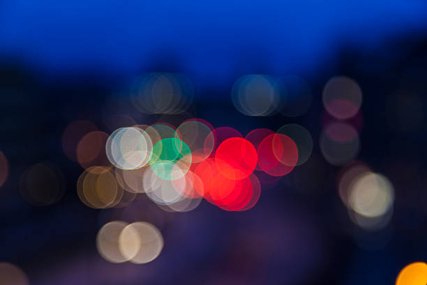 istock blurry lights bokeh background,street and traffic lights 535933203
