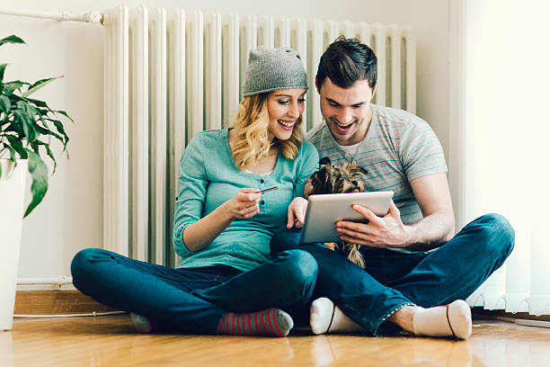 istock Happy Couple Shopping Online WIth Tablet. 535933987