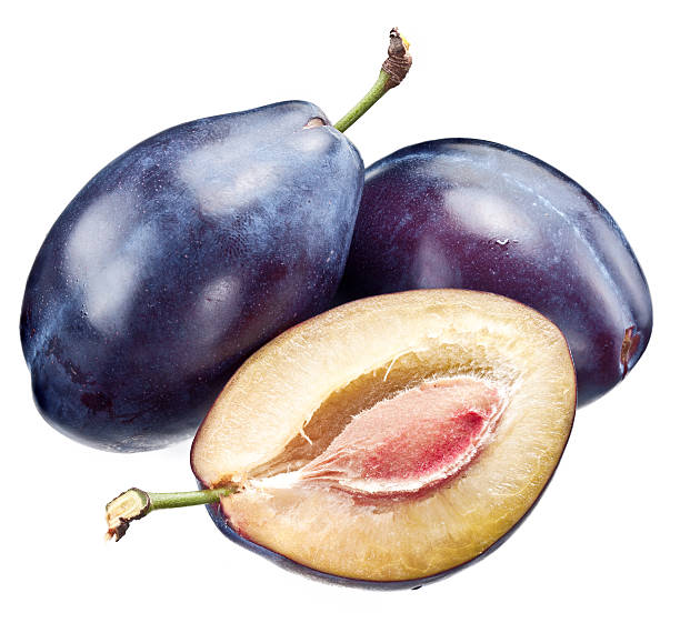 istock Plums and half of plum. 535934421