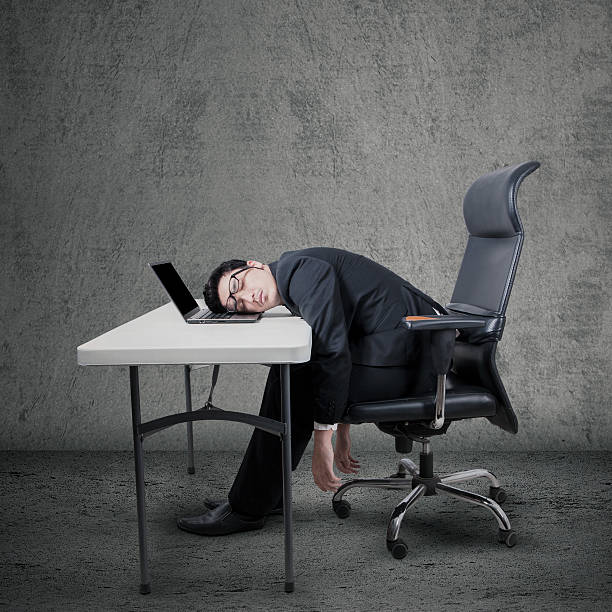istock Tired worker sleeping on laptop at desk 535935317