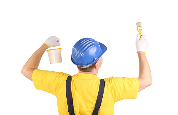istock Worker with paint bucket and brush. 535935437