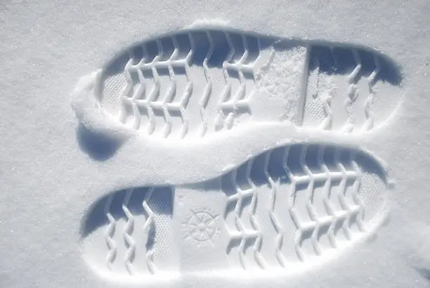 Pair of footprints on the snow